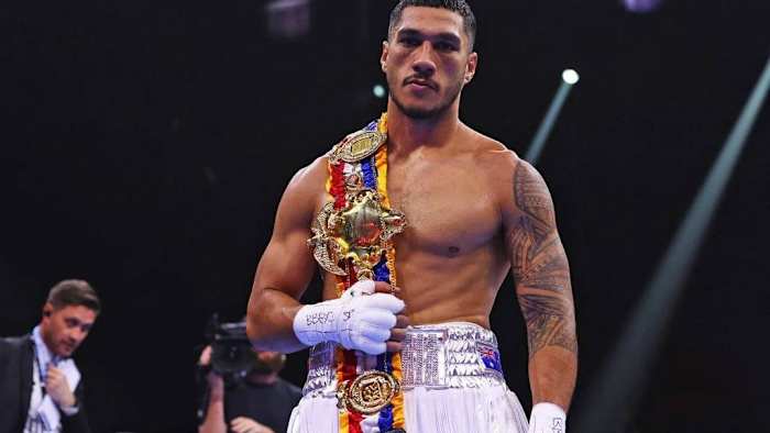 Jai Opetaia celebrates victory with the belt following the Cruiserweight fight between him and Ellis Zoro during the Day of Reckoning. Jai Opetaia left the WBC heavyweight champion Tyson Fury's camp. RICHARD PELHAM/GETTY IMAGES.